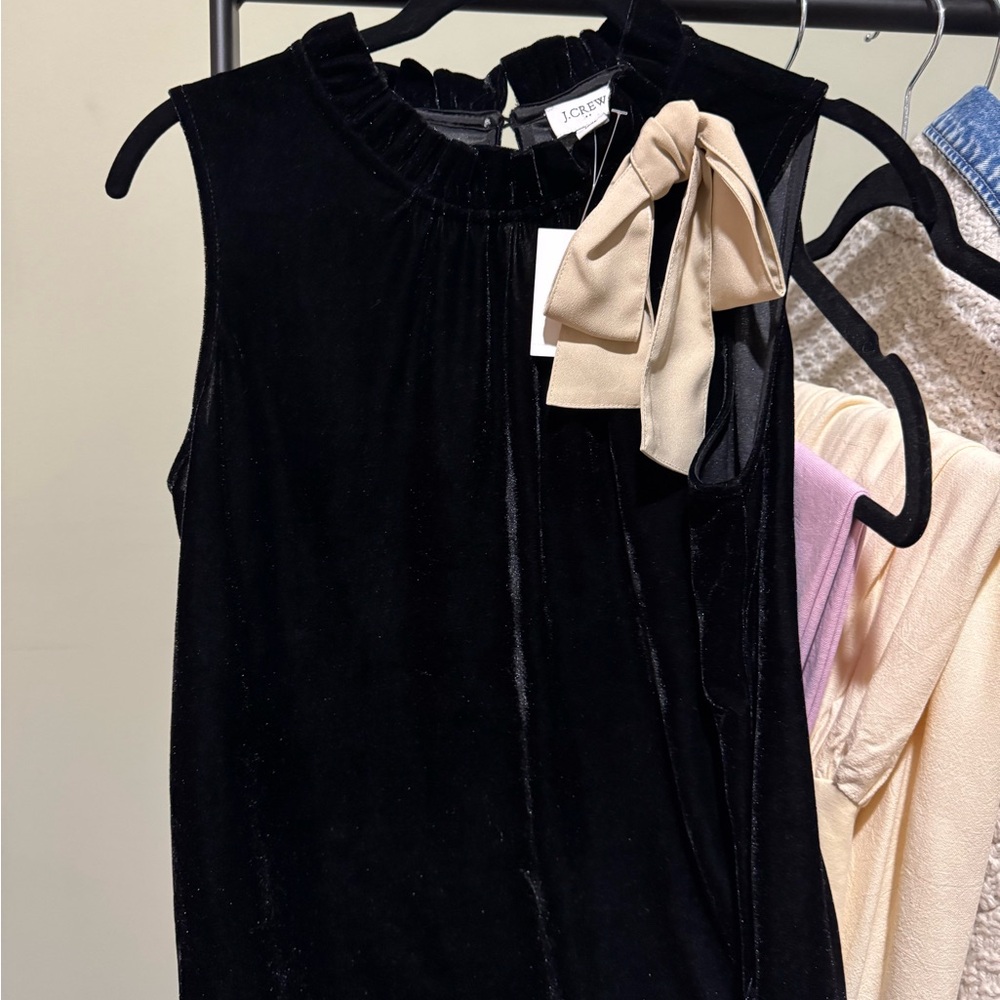 Black Sleeveless Top with Bow Accent